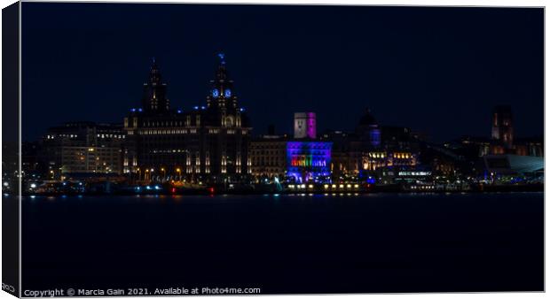 The Liverpool skyline lit up at night Canvas Print by Marcia Reay