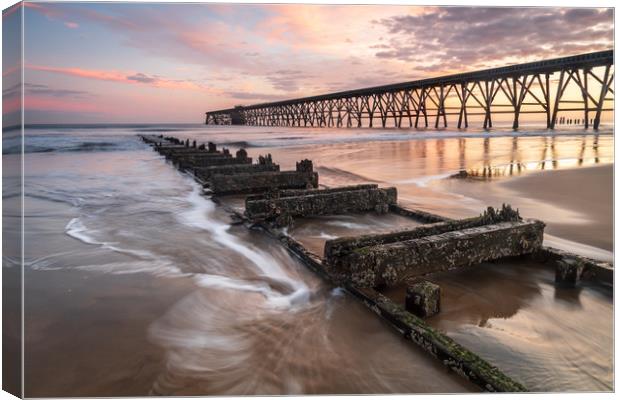Steetley Pier at sunrise Canvas Print by Marcia Reay