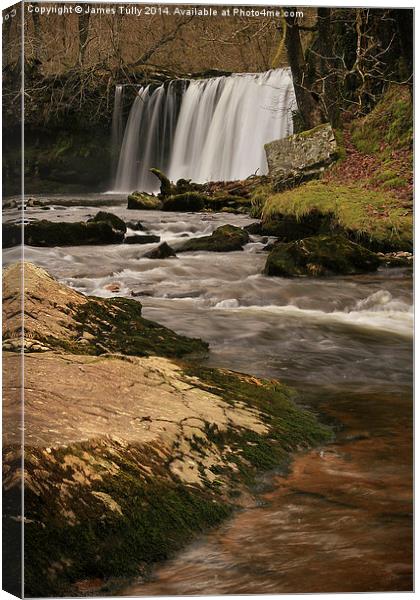  A misty curtain of water falls Canvas Print by James Tully