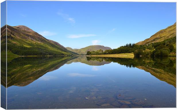 Reflections Crummock water. Canvas Print by Paul Collis