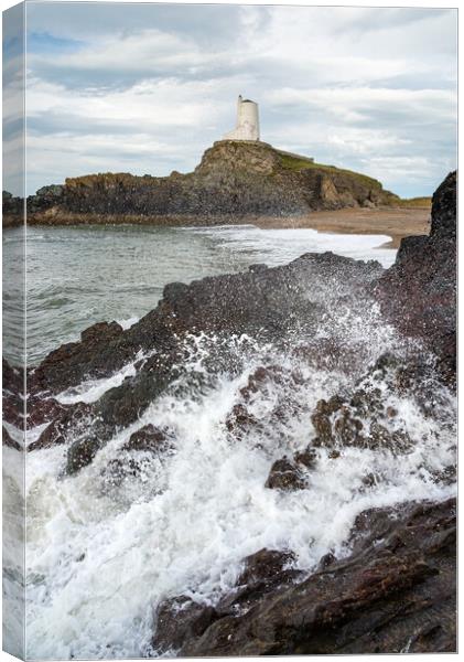 Waves breaking below Twr Mawr lighthouse, Anglesey Canvas Print by Andrew Kearton