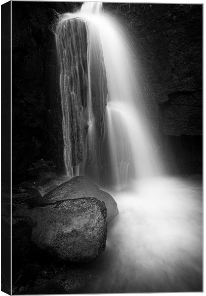  Lumsdale Falls in black and white Canvas Print by Andrew Kearton