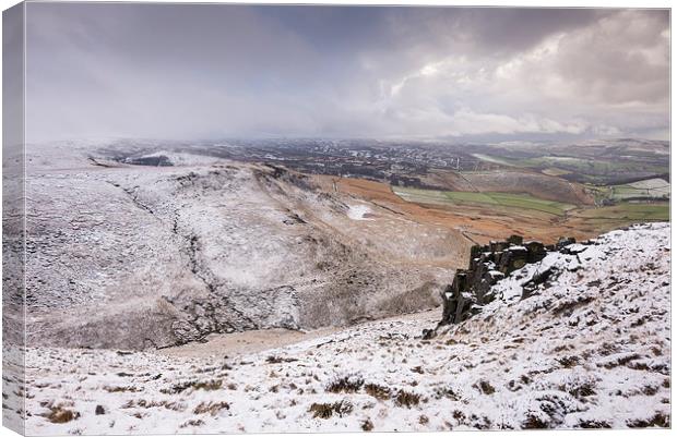  Snow on the hills above Glossop Canvas Print by Andrew Kearton