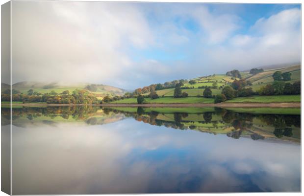 Calm water at Ladybower reservoir, Derbyshire Canvas Print by Andrew Kearton