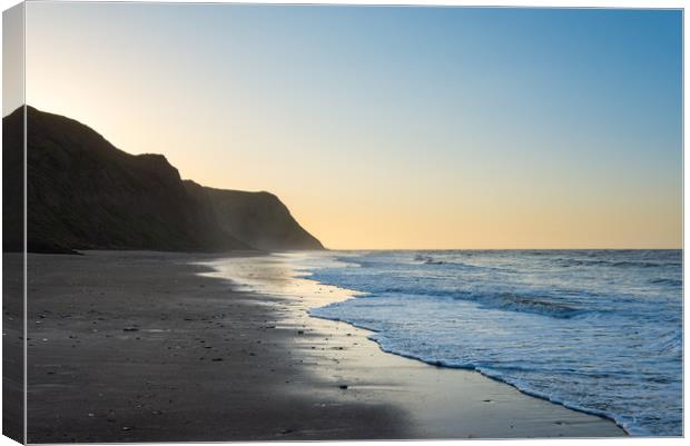 Cattersty Sands at dusk, North Yorkshire, England Canvas Print by Andrew Kearton