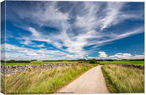 Wispy summer clouds in the White Peak, Derbyshire Canvas Print by Andrew Kearton