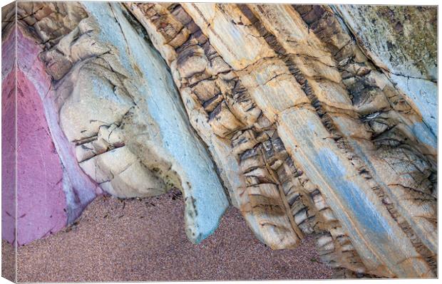 Colourful rocks at Marloes Sands, Pembrokeshire Canvas Print by Andrew Kearton