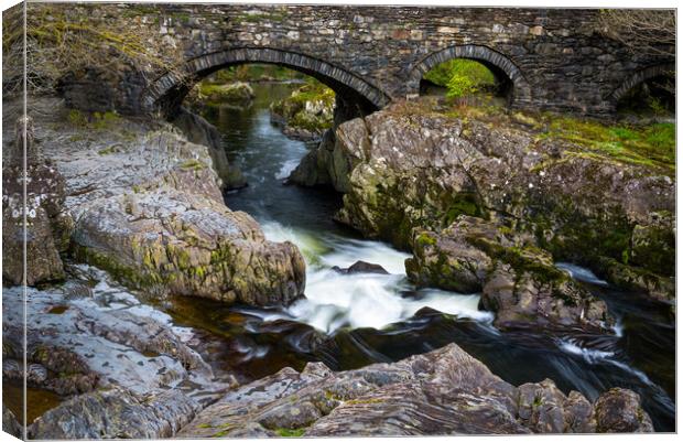 Pont y Pair bridge, Betws-y-Coed, Wales Canvas Print by Andrew Kearton