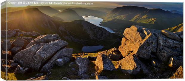  Dawn breaks over Buttermere Canvas Print by John Malley