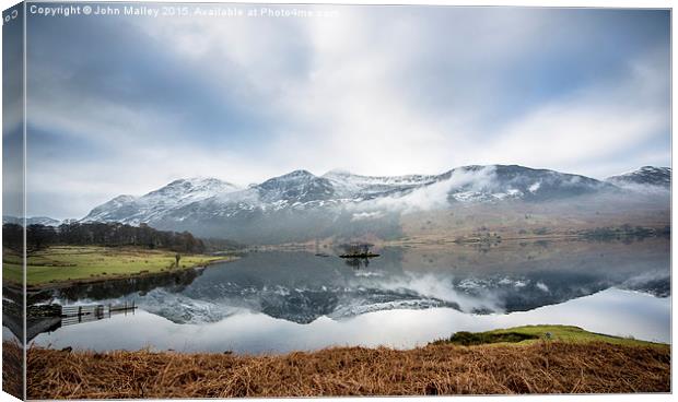  Reflections of Crummock Water Canvas Print by John Malley