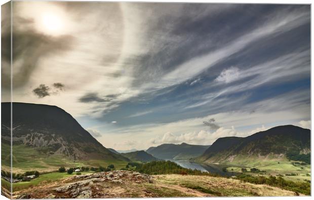 A Buttermere Sun Halo Canvas Print by John Malley