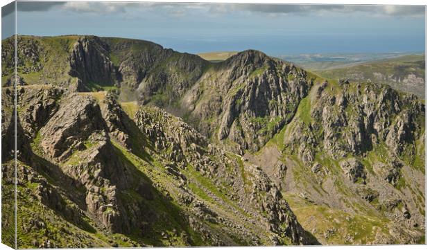 The Craggy Face of Steeple  Canvas Print by John Malley