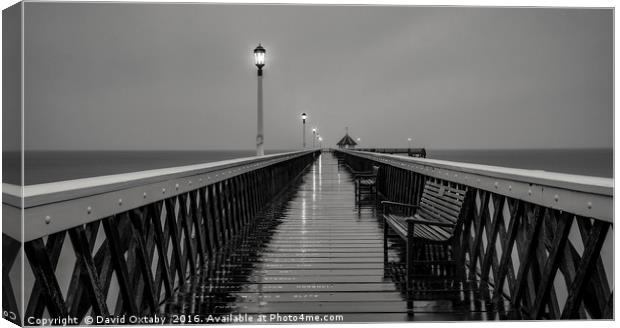 Wet evening at Yarmouth Pier Canvas Print by David Oxtaby  ARPS
