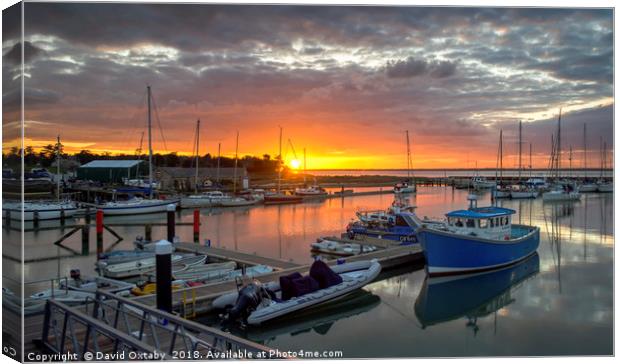 Sun setting over Yarmouth Harbour Canvas Print by David Oxtaby  ARPS