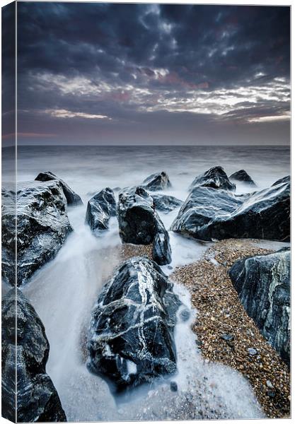  Jagged rocks Canvas Print by Darren Carter