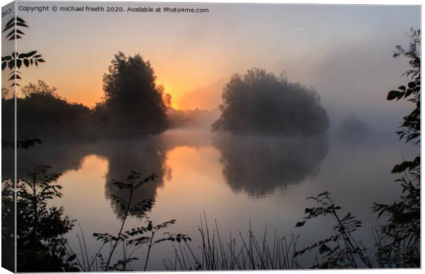 Sunrise Cotswold water park Canvas Print by michael freeth