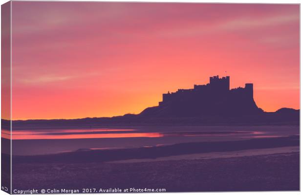 Bamburgh Castle Sunrise Silhouette Canvas Print by Colin Morgan