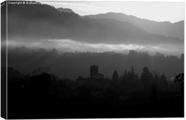  Early morning mist in the Sercio vally and Appeni Canvas Print by Graham Light