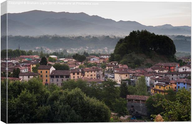 Early morning mist in the Sercio vally and Appenin Canvas Print by Graham Light