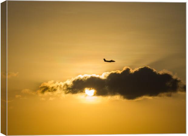 Plane in the sunset  Canvas Print by Gail Johnson