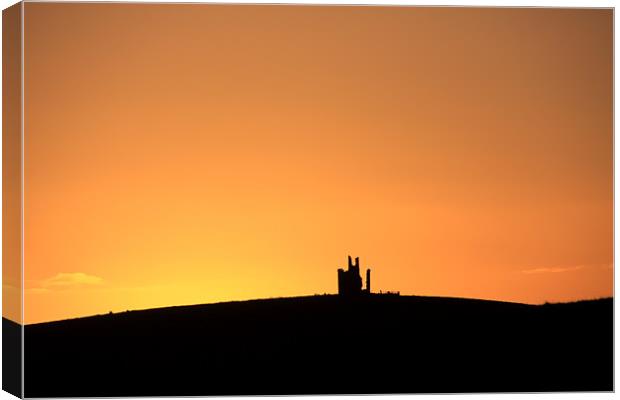 Runied castle at sunset Canvas Print by Gail Johnson