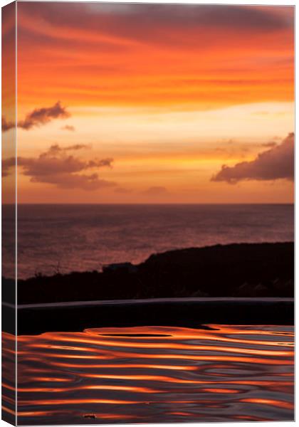Sunset over a pool overlooking the sea - Curacao C Canvas Print by Gail Johnson