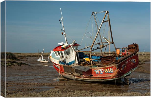 Whitby Crest at Brancaster Staithe Canvas Print by John Edwards