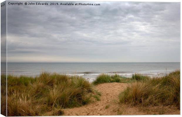 Marram and the sea Canvas Print by John Edwards