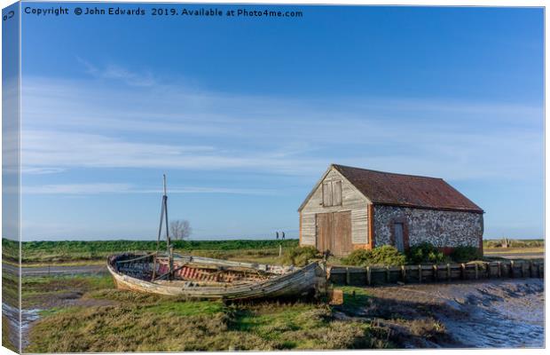 The Boat and Coal Barn at Thornham Staithe Canvas Print by John Edwards