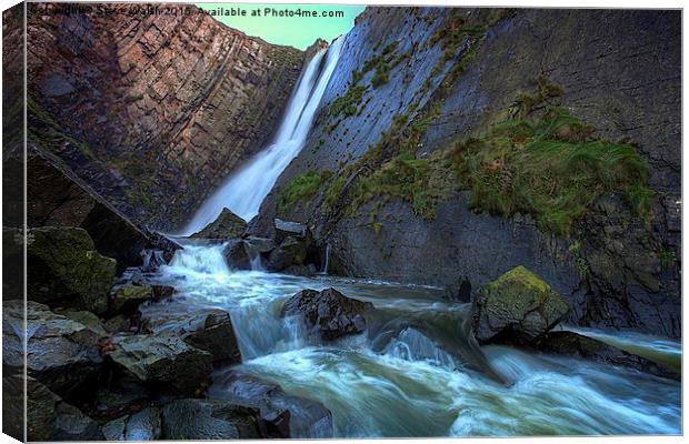  Speke's Mill Mouth waterfall. Canvas Print by Steve Walsh