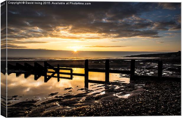  Sunrise over Spittal Beach  Canvas Print by David Irving