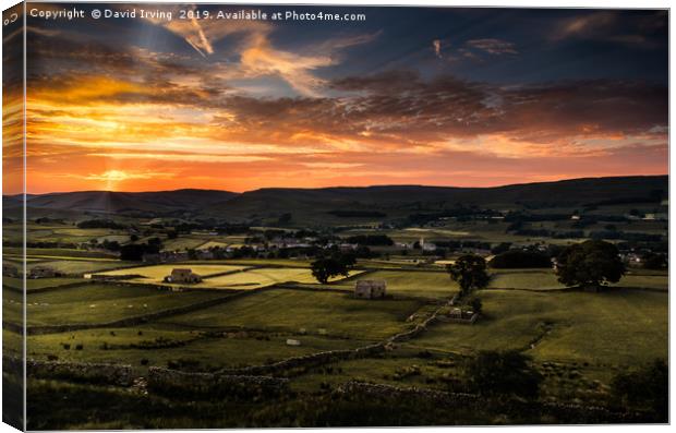Sunset overlooking the village of Hawes in the Yor Canvas Print by David Irving