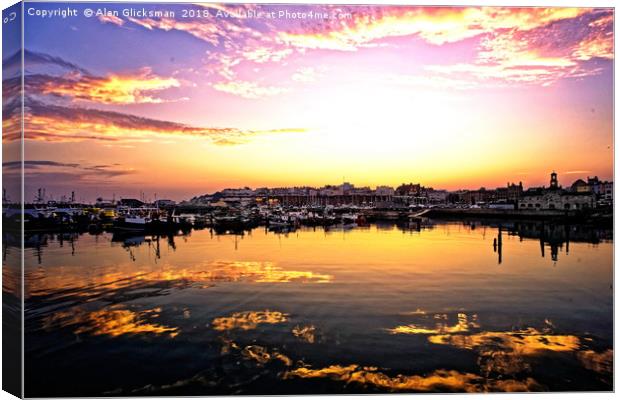 Sunset on the water in the harbour Canvas Print by Alan Glicksman