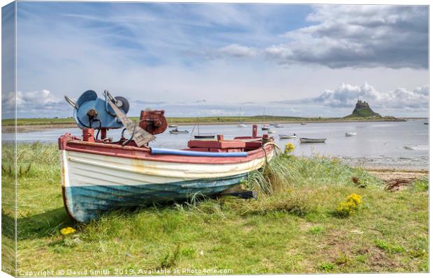 Boat Overlooking Holy Island Harbour Canvas Print by David Smith
