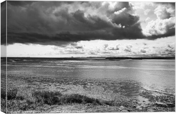 Dramatic Clouds Above Holy Island Canvas Print by David Smith