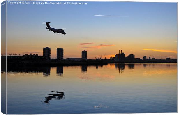  Arriving Plane at Sunset Canvas Print by Ayo Faleye