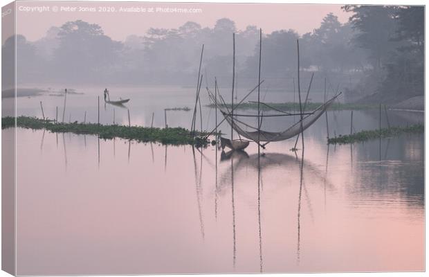 Dawn fishing nets Canvas Print by Peter Jones