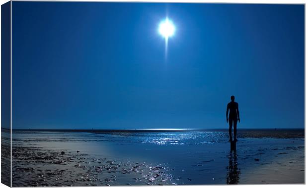 Iron statue silhouette against a clear blue sky Canvas Print by ken biggs