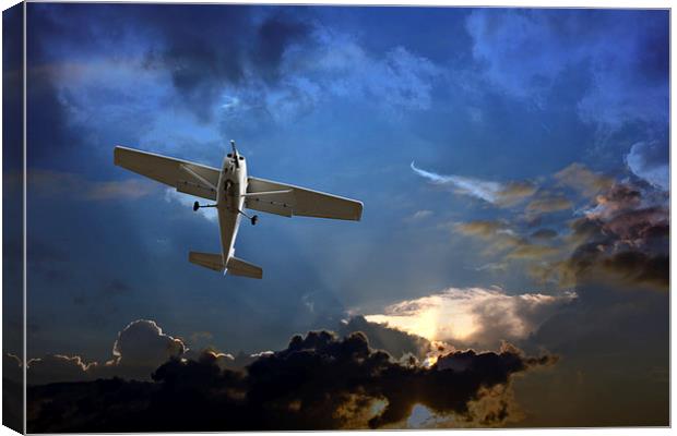 Small fixed wing plane against a stormy sky  Canvas Print by ken biggs