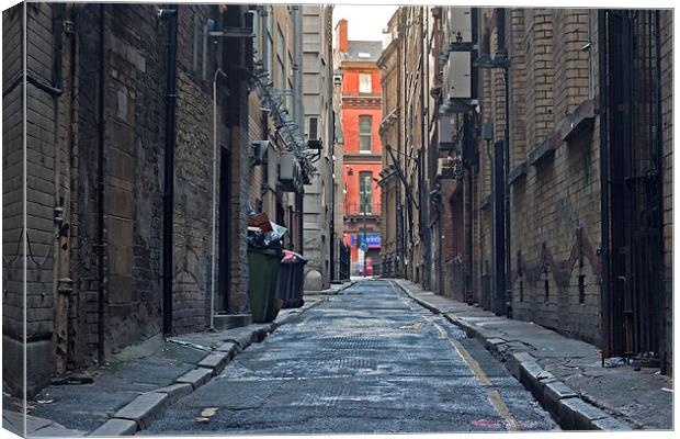 Looking down an empty inner city alleyway Canvas Print by ken biggs