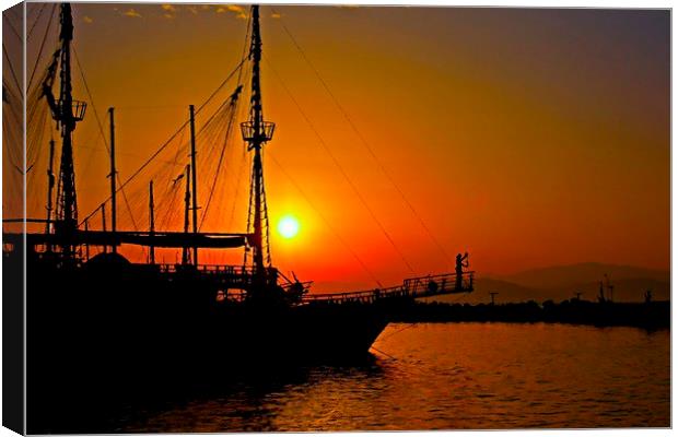 a ship in silhouette at sunset Canvas Print by ken biggs