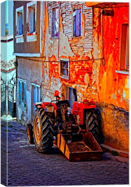  a tractor parked in a village street Canvas Print by ken biggs