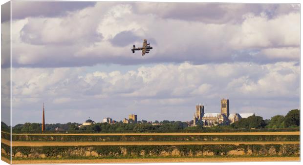 Lancaster Bomber PA474 over Lincoln Canvas Print by Andrew Scott