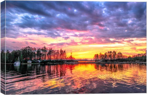 Sunset on the lake Canvas Print by Svetlana Korneliuk