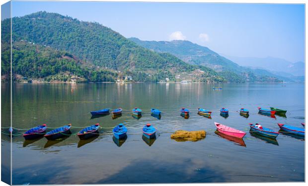 landscape view of boat on Phewa Lake Canvas Print by Ambir Tolang