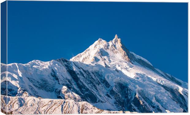Landscape view of snow covered mountain Manaslu Canvas Print by Ambir Tolang