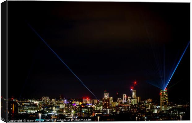Leeds skyline with Leeds Laser Light Night Canvas Print by Gary Turner