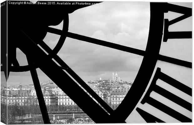  Paris through the clock window of the Musee d'Ors Canvas Print by Adrian Beese