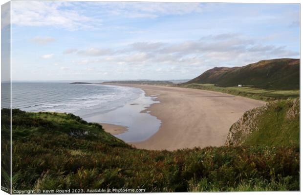 Rhossili Beach on the Gower peninsula in Wales. Canvas Print by Kevin Round