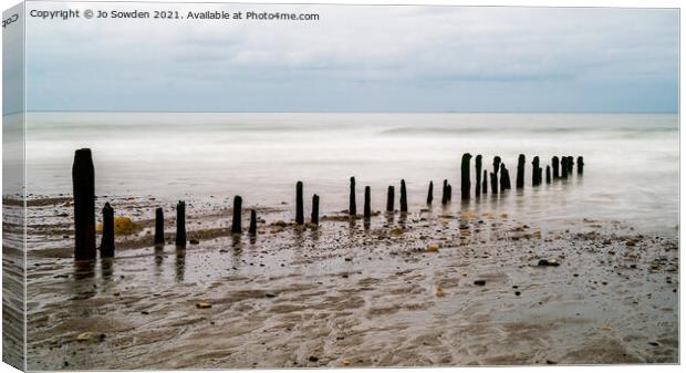 Derelict Sea Groynes Canvas Print by Jo Sowden